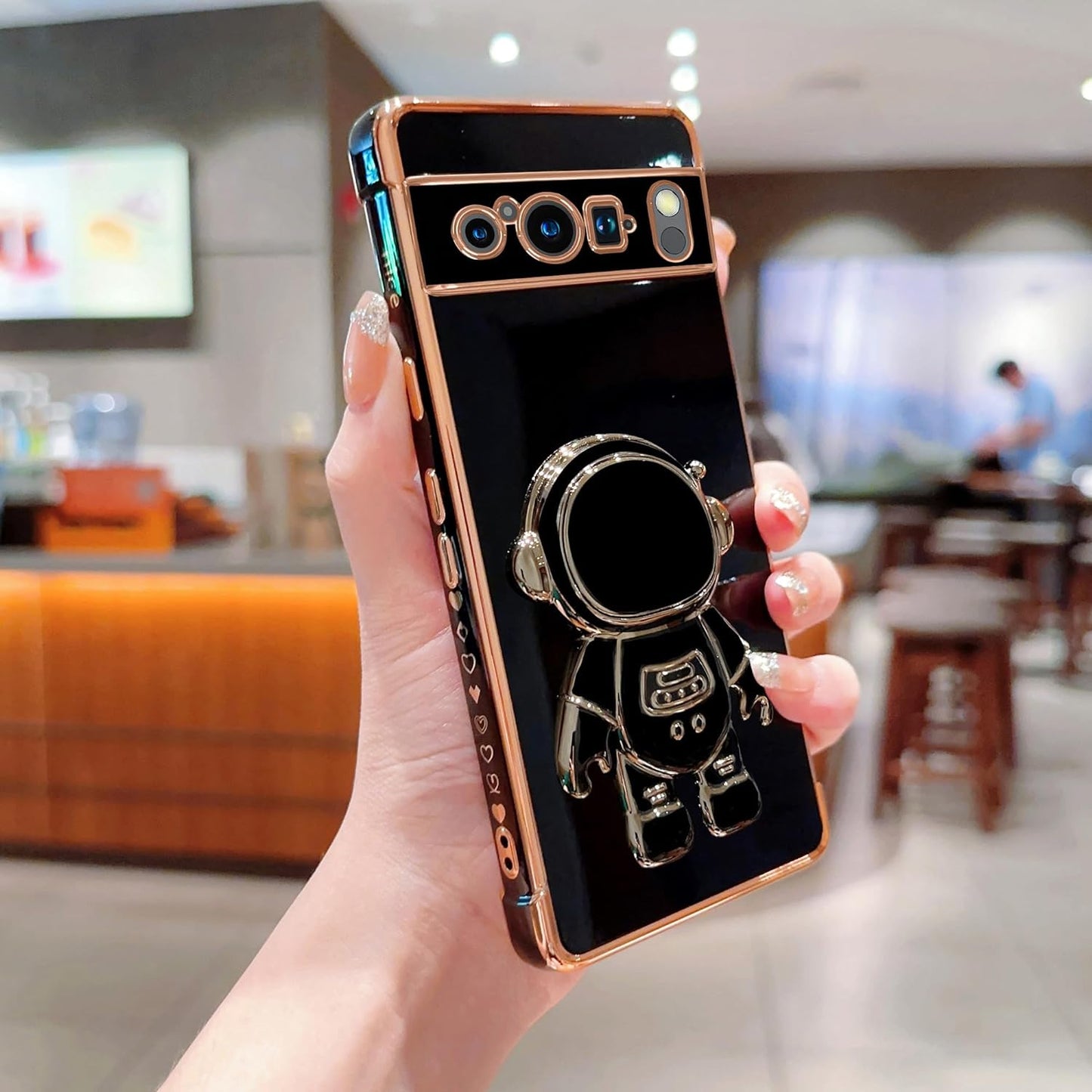 Phylla Phone Case for Google Pixel 8 Pro 6.7” 5G,Luxury Plating Astronaut Stand Holder Phone Case with Cute Love Heart Side Small Pattern Soft Silicone Shockproof Kickstand Cover Bumper (Black)  PHYLLA\1   