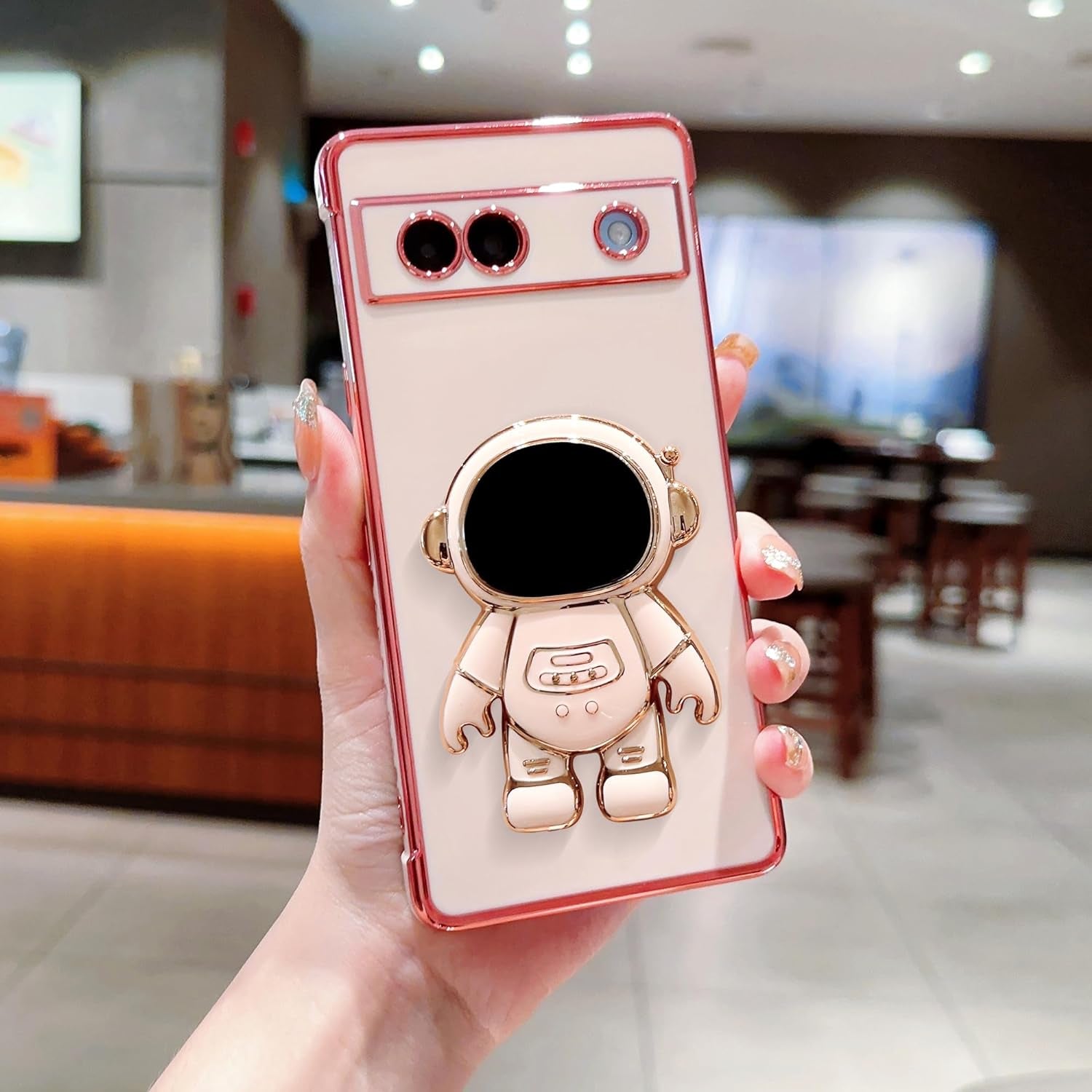 Phylla Phone Case for Google Pixel 7A 6.1” 5G,Luxury Plating Astronaut Stand Holder Phone Case with Cute Love Heart Side Small Pattern Soft Silicone Shockproof Kickstand Cover Bumper (Pink)  phylla   