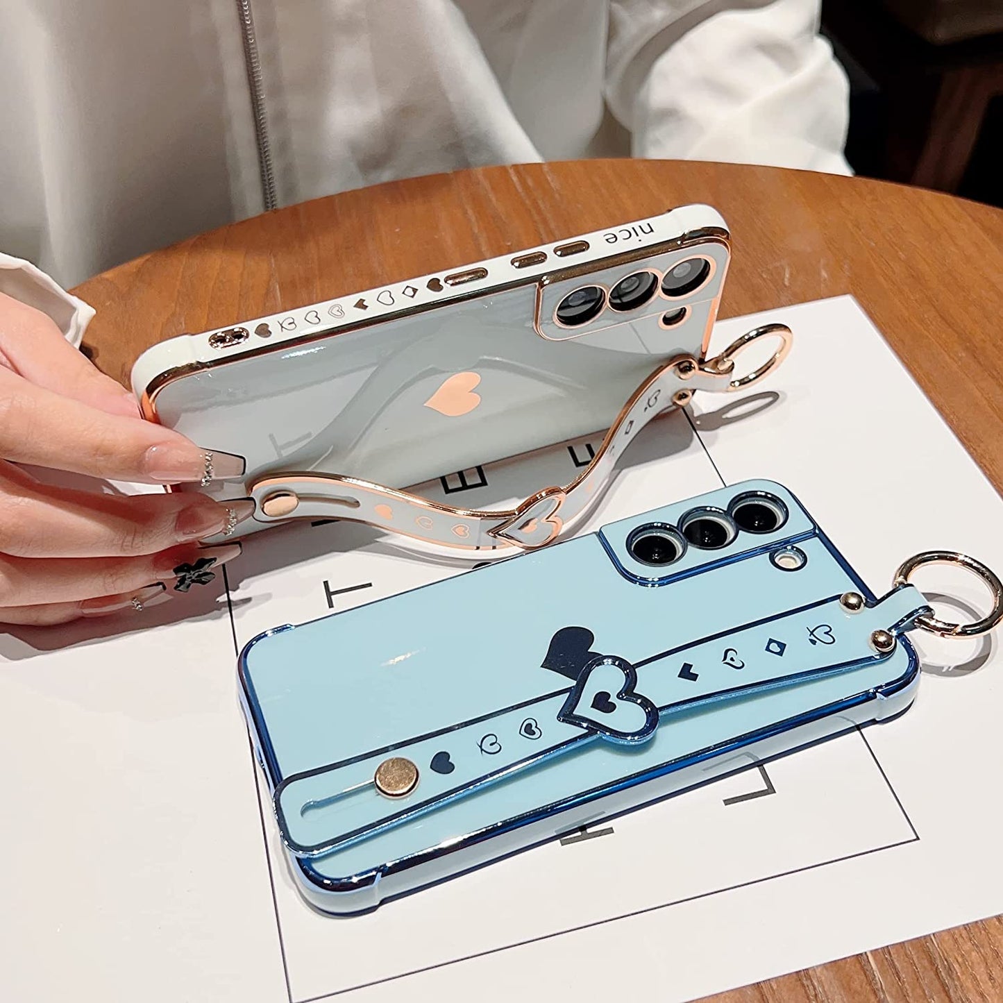 DEFBSC Compatible with Samsung Galaxy S22 plus Case, Electroplated Edge Love Heart Case with Wrist Strap, Full Camera Protection Raised Reinforced Corners Shockproof Soft TPU Cover, White  DEFBSC   