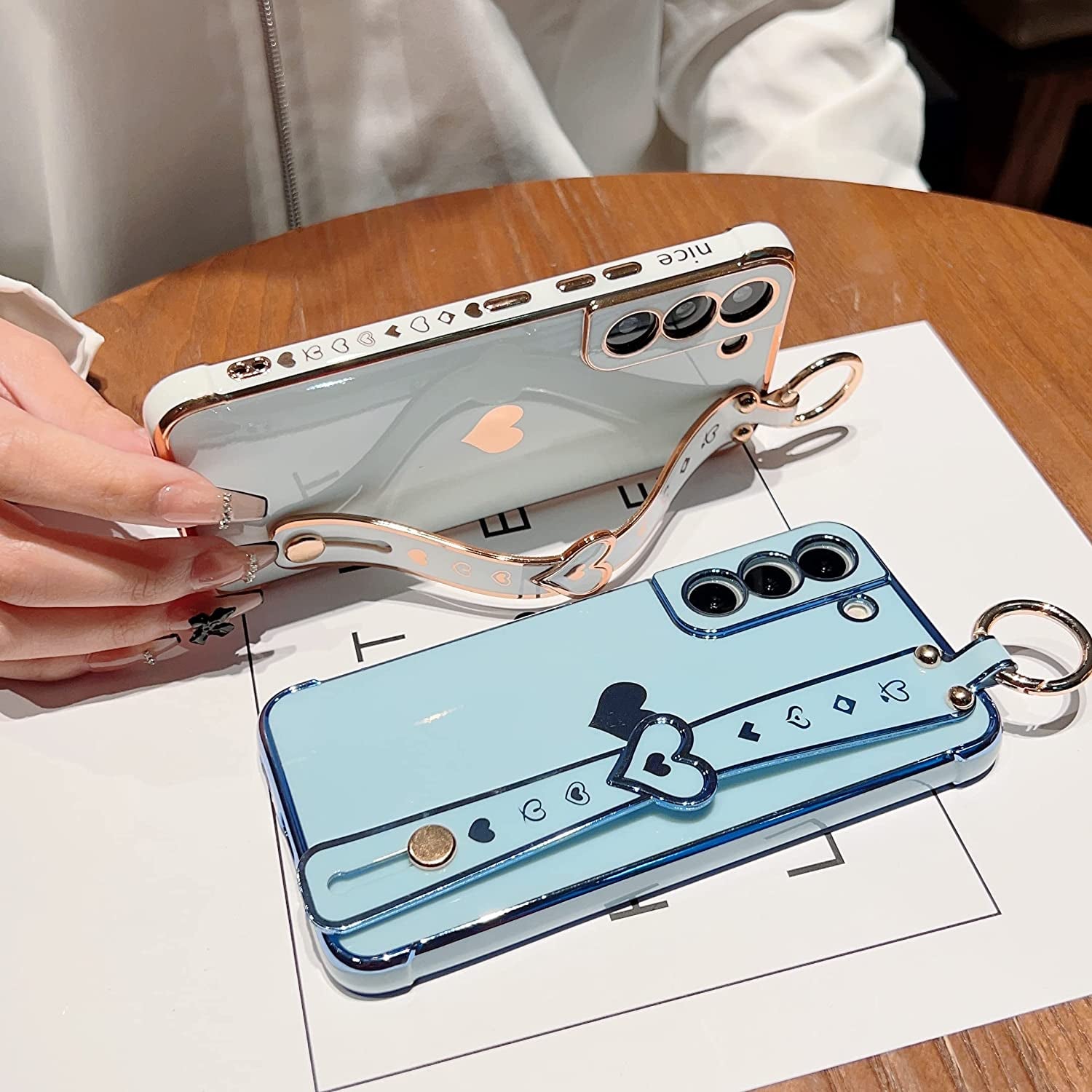 DEFBSC Compatible with Samsung Galaxy S22 Case, Electroplated Edge Love Heart Case with Wrist Strap, Full Camera Protection Raised Reinforced Corners Shockproof Soft TPU Cover, Black  DEFBSC   