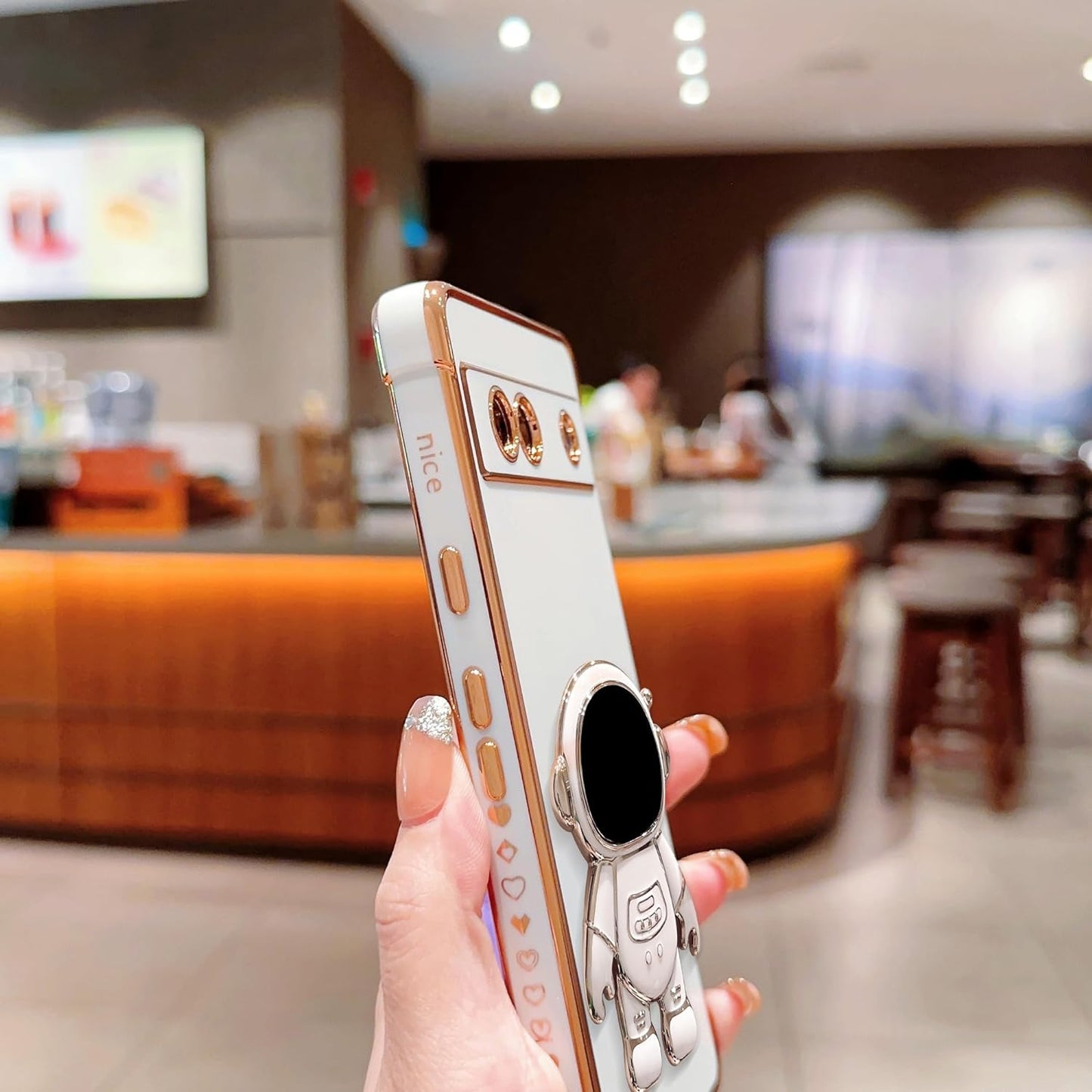 Phylla Phone Case for Google Pixel 7A 6.1” 5G,Luxury Plating Astronaut Stand Holder Phone Case with Cute Love Heart Side Small Pattern Soft Silicone Shockproof Kickstand Cover Bumper (White)  phylla   