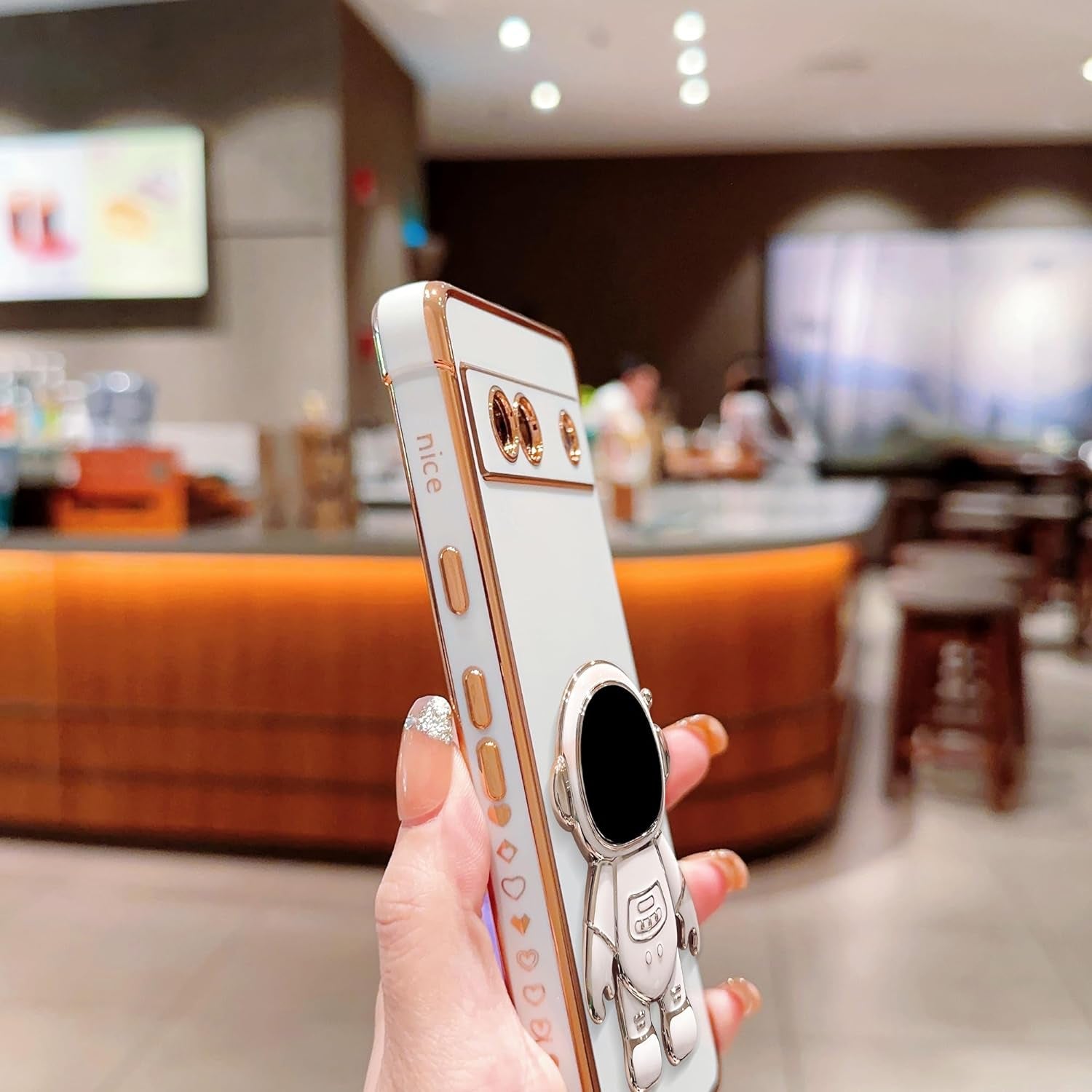 Phylla Phone Case for Google Pixel 7A 6.1” 5G,Luxury Plating Astronaut Stand Holder Phone Case with Cute Love Heart Side Small Pattern Soft Silicone Shockproof Kickstand Cover Bumper (White)  phylla   